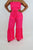 KEEP IT COMING JUMPSUIT - FUCHSIA